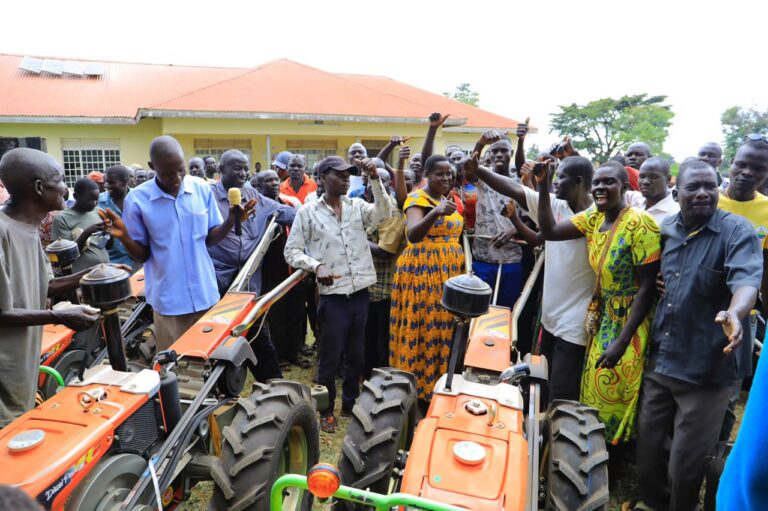 JOY AS BUKEDEA PEOPLE RECEIVE TRACTORS & OTHER EQUIPMENT WORTH UGX 300M DONATED BY SPEAKER AMONG TO BOOST AGRICULTURE